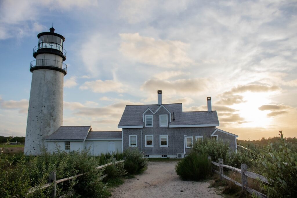 A light house attached  to a light house keeper's house in Cape Cod, a great place to get a Massachusetts DSCR loan.