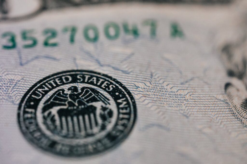 A close-up of the US seal on a bank note to represent the financing you can get with rental property mortgage loans.