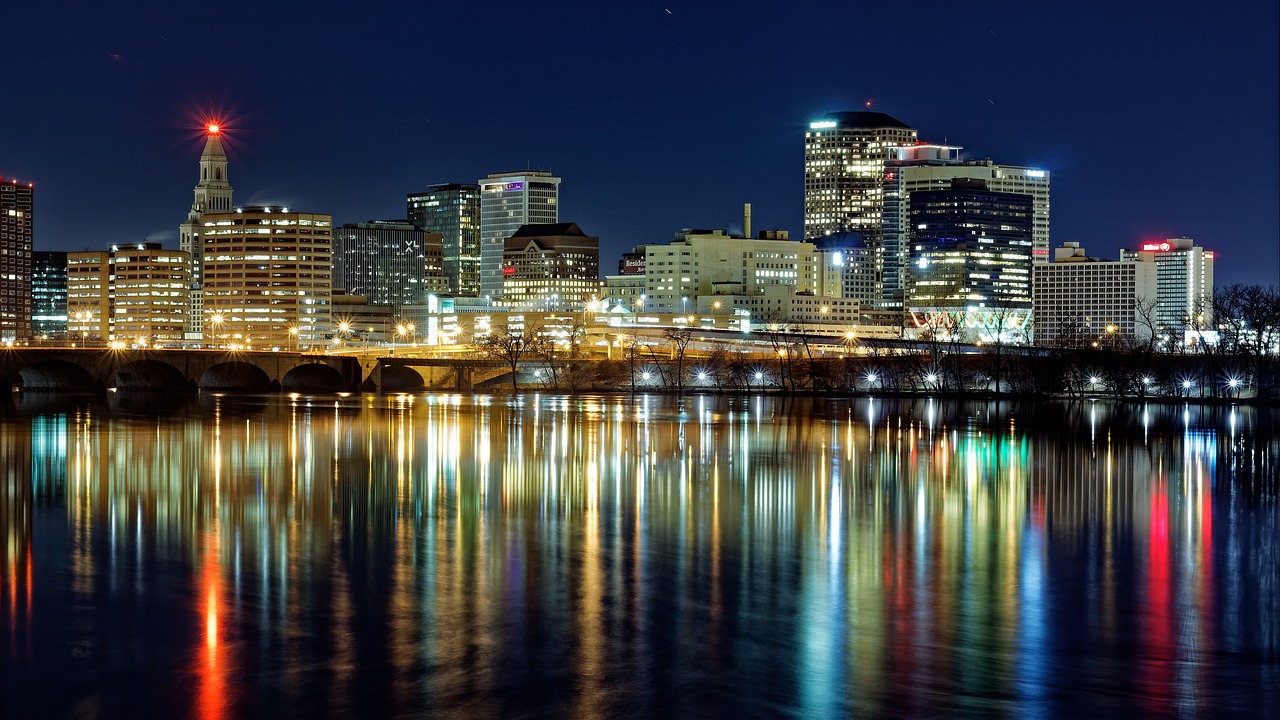 A nighttime view of downtown Hartford, a city with lots of potential for a DSCR loan Connecticut.