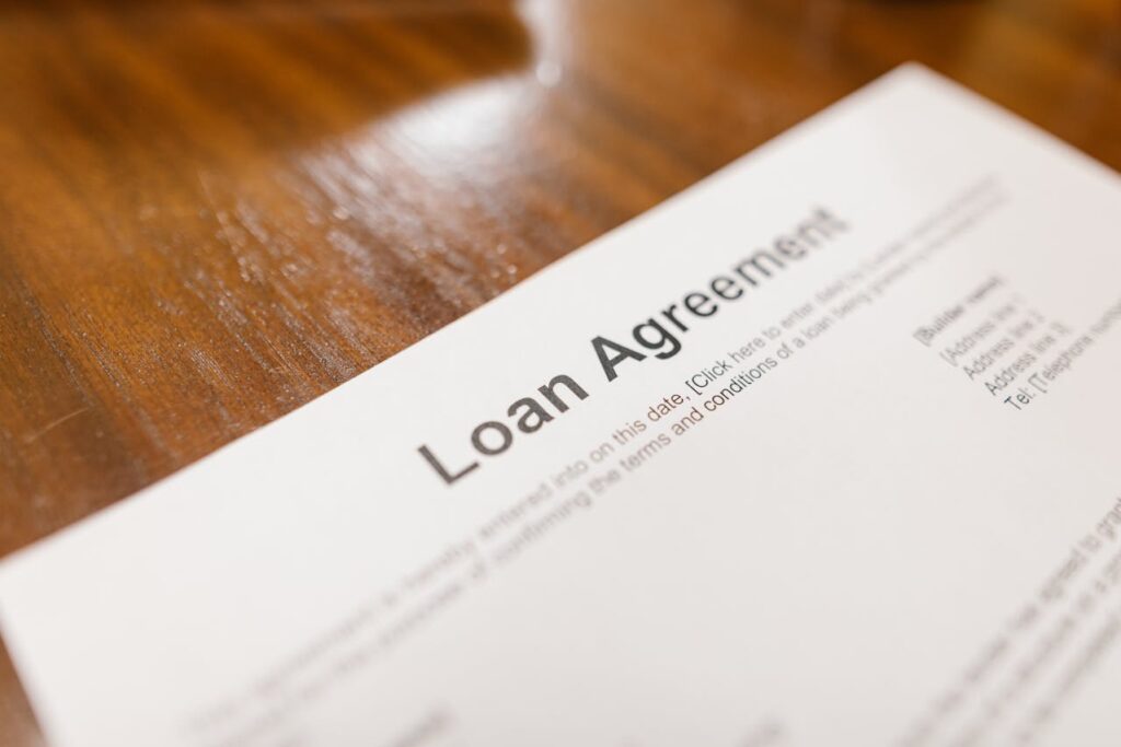 A close-up of a loan agreement for a home equity loan, one alternative to a HELOC for investment property. 