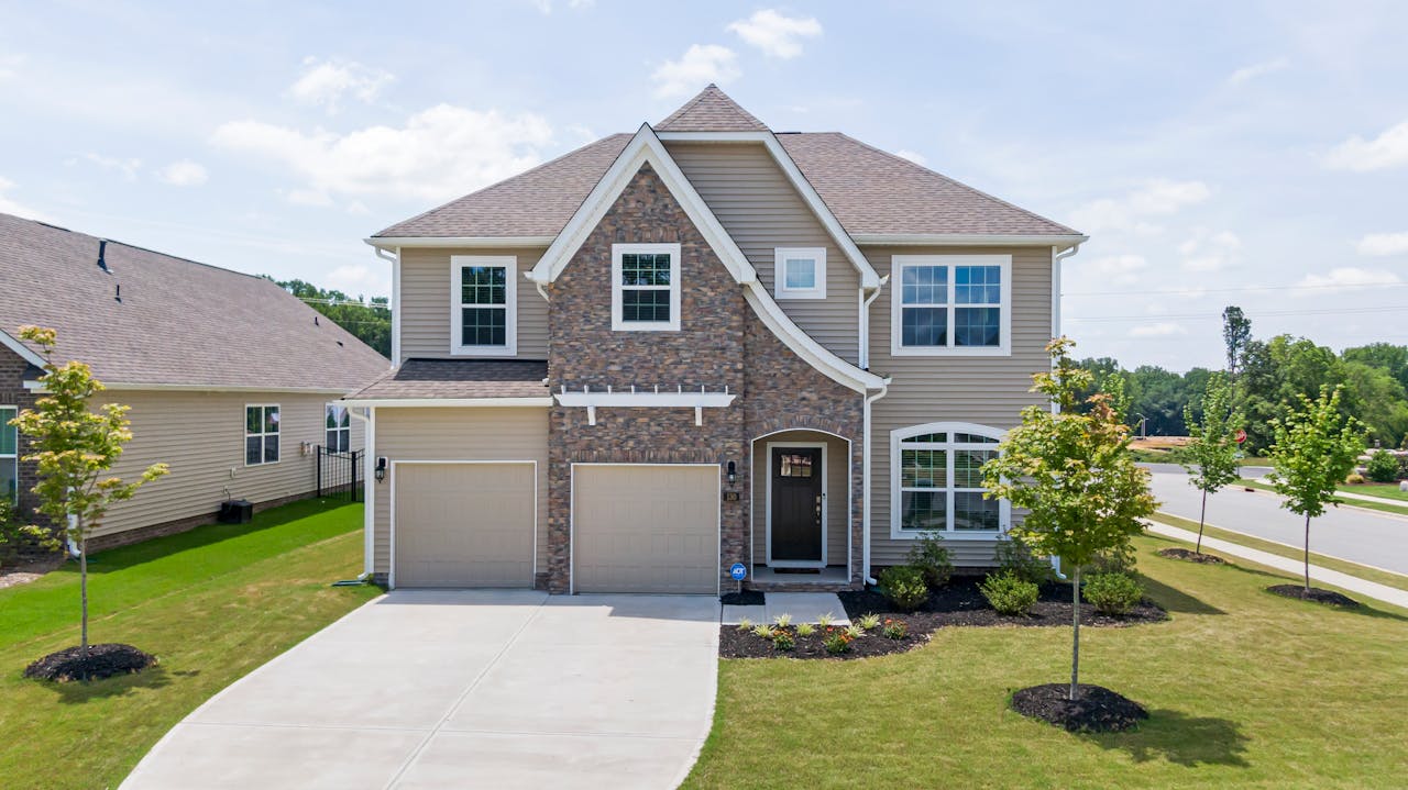 A brick colonial home, which could be eligible for a home equity loan or refinancing.