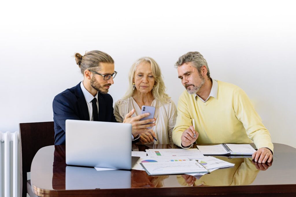 A couple is speaking to their lender about how to prove income when self employed, so they can qualify for a loan. 