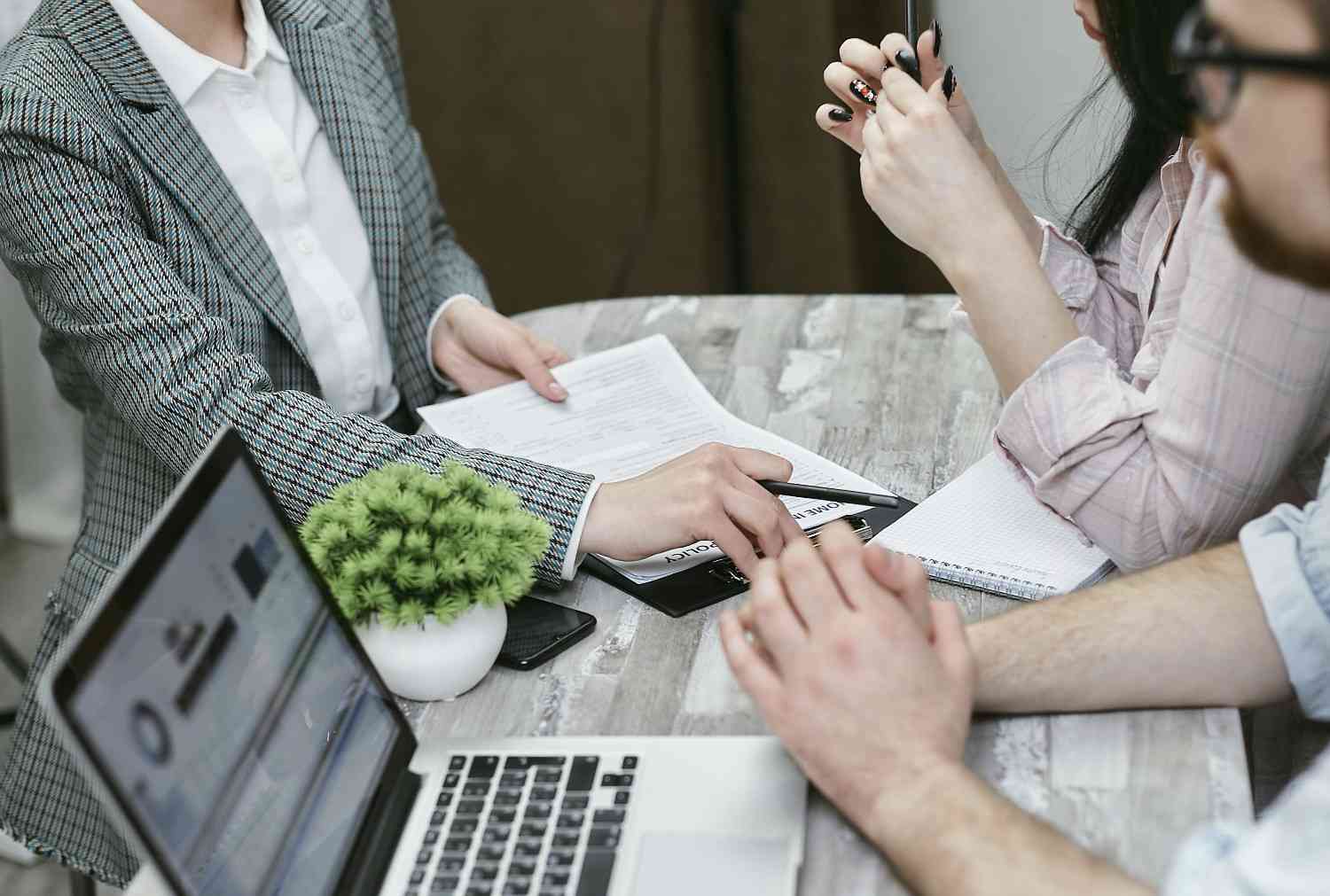 Mortgage broker discussing self-employed mortgage rates
